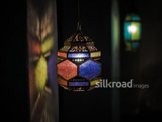 Colurful lantern on the wall|-