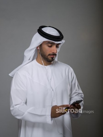 Businessman checking his mobile|