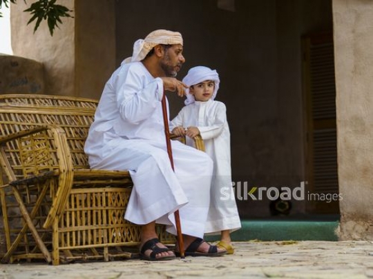 Boy spending time with grandfather|-