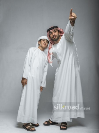 Father pointing to son