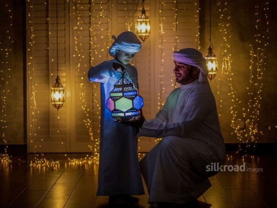 Father and son celebrating ramadan|-