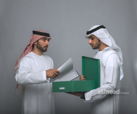 Manager taking documents out of the box