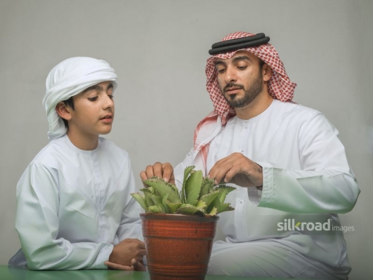 Middle Eastern father and son bonding