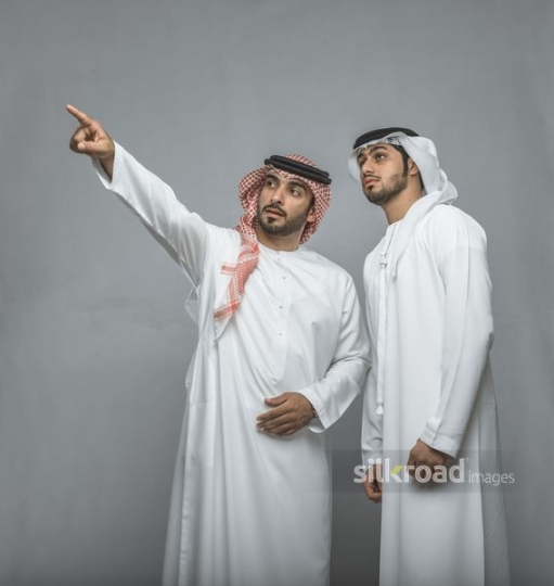Man drawing the attention of his friend|