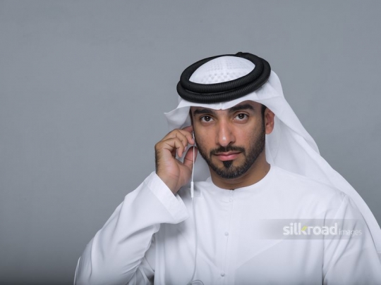 man fixing earphones