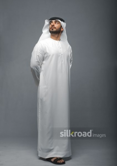 Arabian man looking up