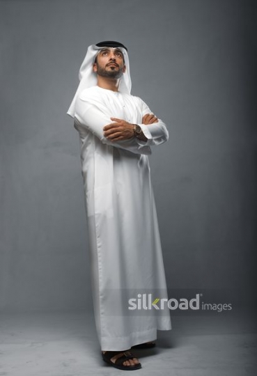 Arabian man looking up
