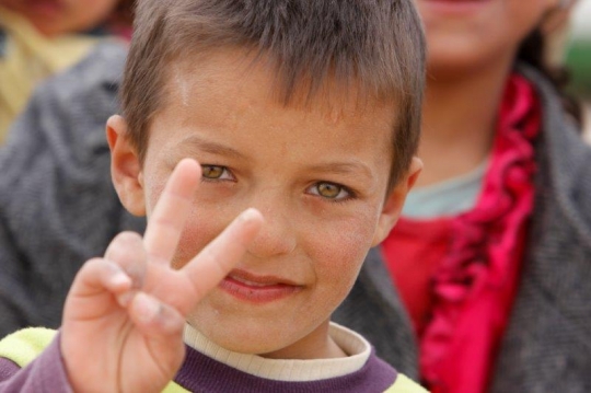 Syrian Kid show victory sign f