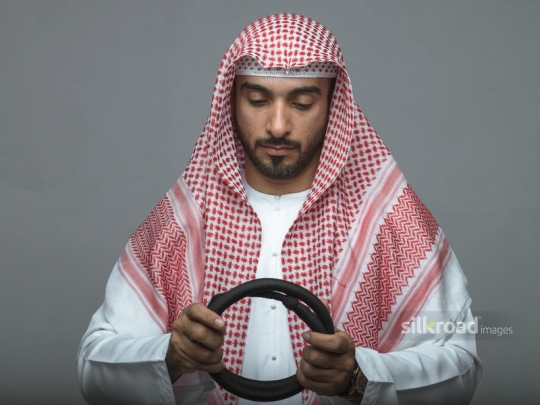 Man wearing head cover