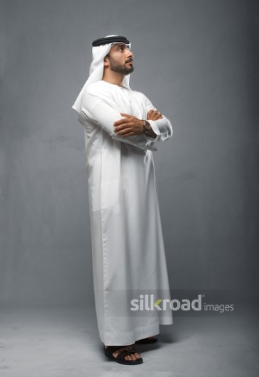 Middle Eastern man arms crossed