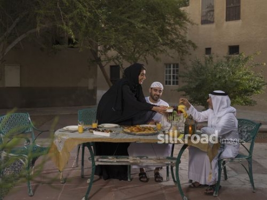 REPLACE - Arab woman offering her father in law food|-