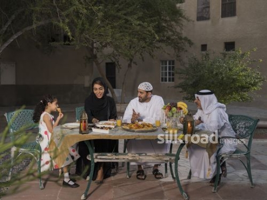 Middle Eastern family having Iftar together|-