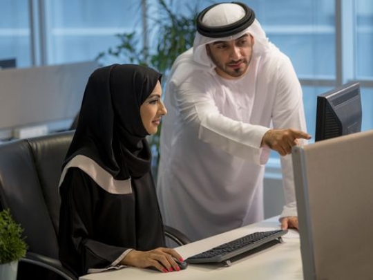 Arab business people at the office working together|