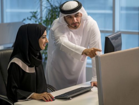 Business man and woman smiling|