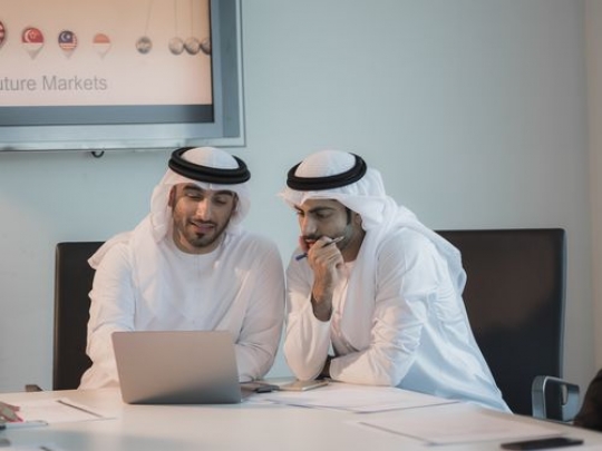 Arab men talking during a meeting at the office|-