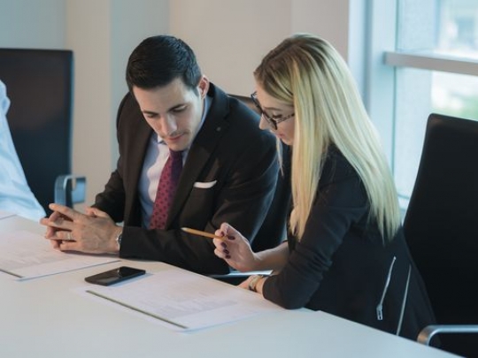 Colleagues during a meeting |-