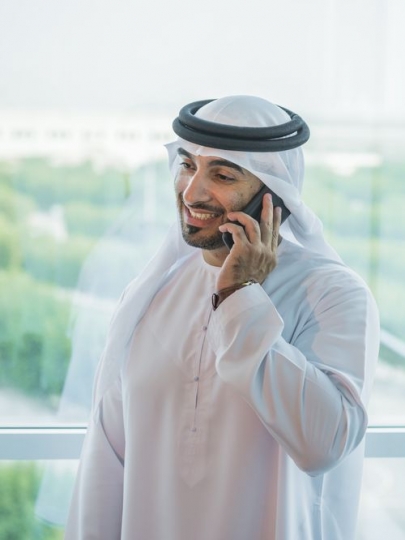 Businessman making a phone call|-