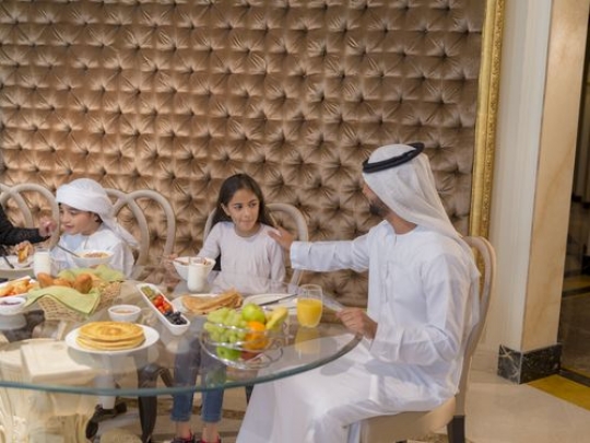 Family sitting together|-