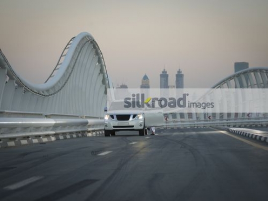 Middle Eastern man getting out of the car|