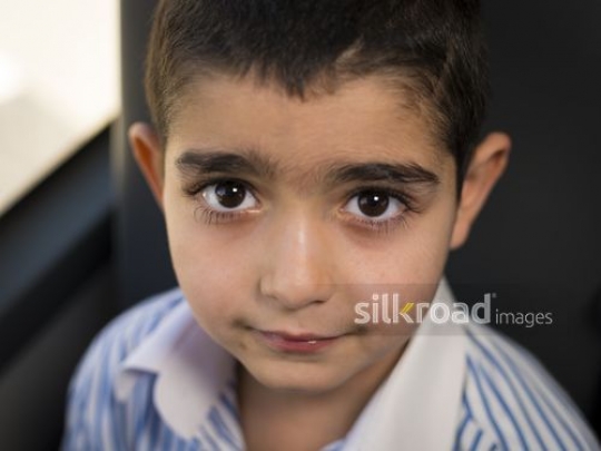Close up of a Middle Eastern kid|-