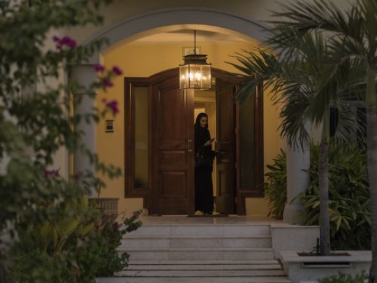 Arab woman leaving the house|-
