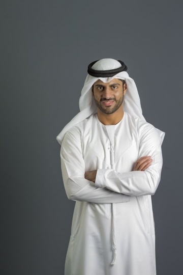 Portrait of an arab business man dressed in the traditional UAE attire|