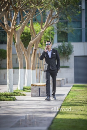 Successful Middle Eastern Businessman walking |-