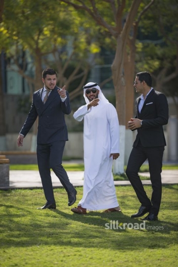Western Businessman talking to his colleagues |-