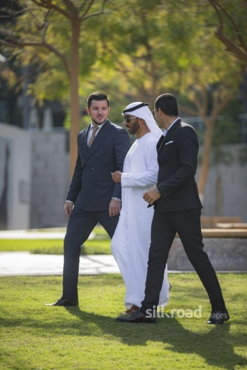Successful Businessmen talking to each other|-