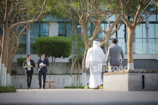 Successful businessmen walking|-