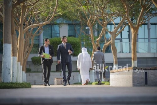 Group of Businessmen walking|-