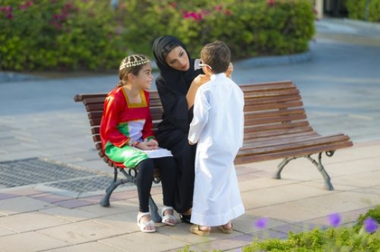Mother and her two kids getting ready for national day|-