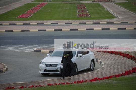 Middle Eastern Businesswoman walking|