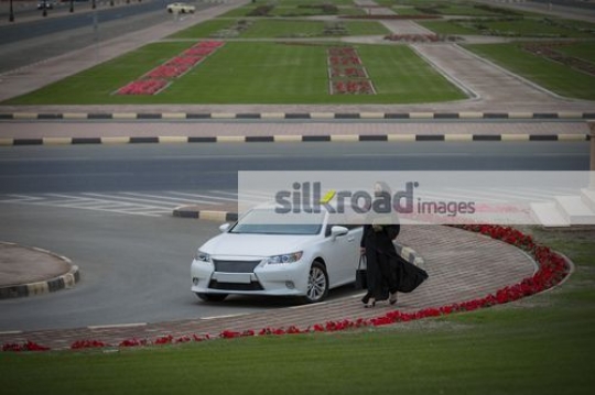 Middle Eastern Businesswoman walking|