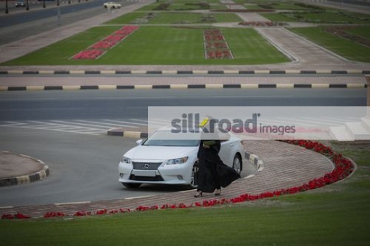 Middle Eastern Businesswoman walking|