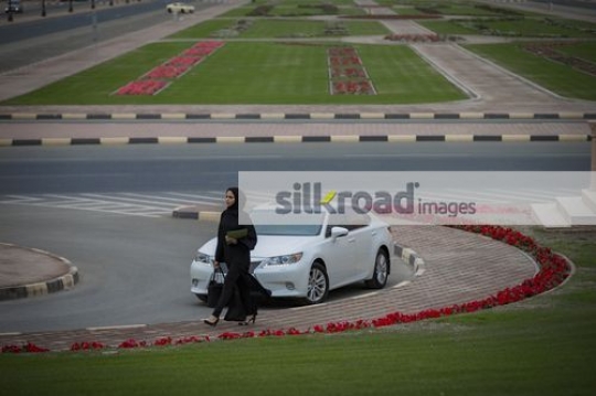 Middle Eastern Businesswoman walking |