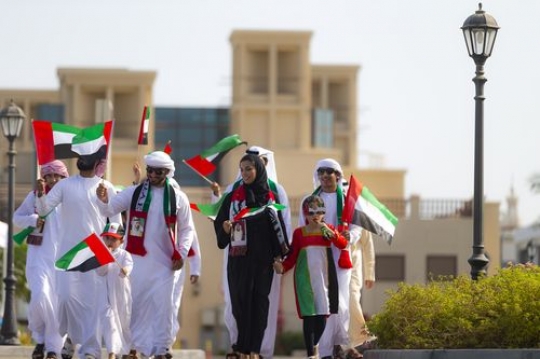 Family and friends celebrating the UAE National Day|