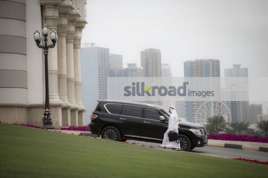 Middle Eastern Businessman walking|