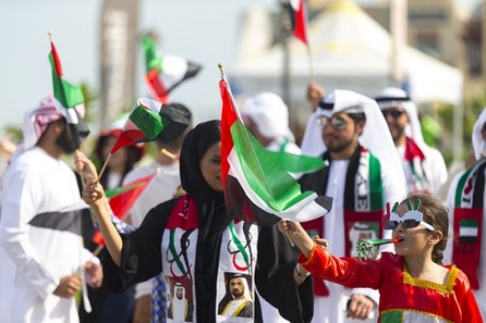 Young arab girl and arab woman celebrating National Day|