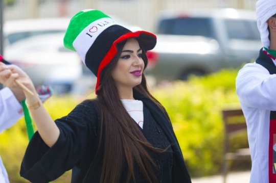Arab woman at a Parade celebrating the UAE National Day |