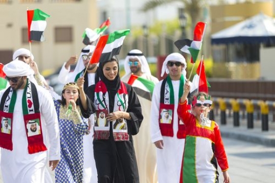 Arab family and friends at a National Day Parade|