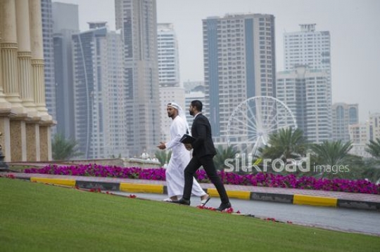 Middle Eastern Businessmen walking together|-