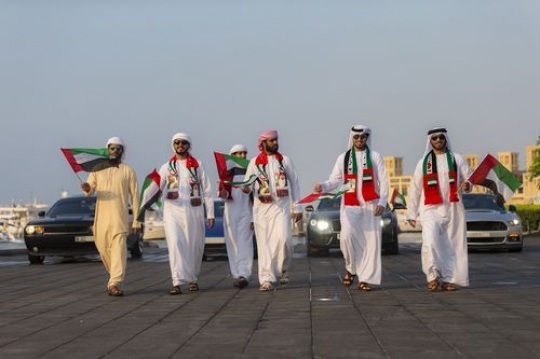 Arab men representing their country during the National Day Parade|-