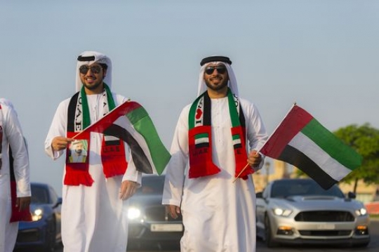 Two Emirati men during a National day Parade|-