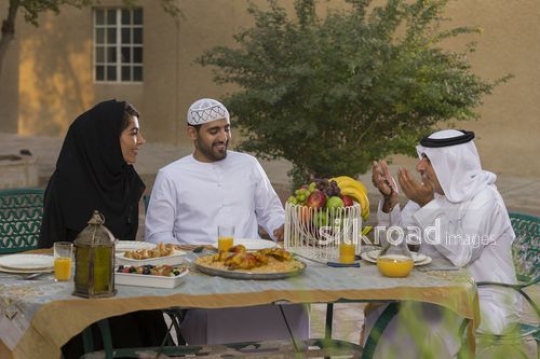 REPLACE - Arab family having Iftar together|-