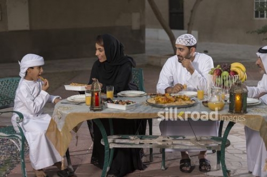 REPLACE - Arab family having Iftar together|-