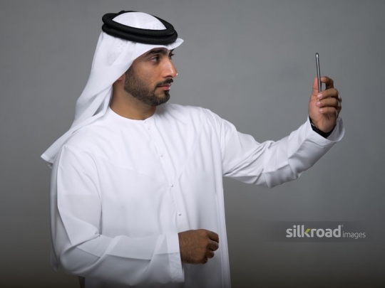 Businessman taking selfie