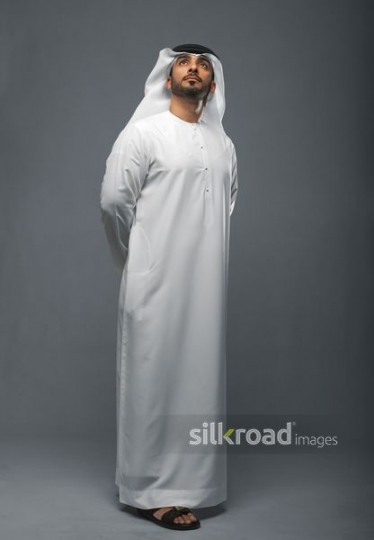Arabian man looking up with pride