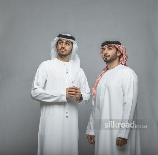 Businessmen standing with pride