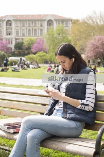 Woman texting on her mobile|